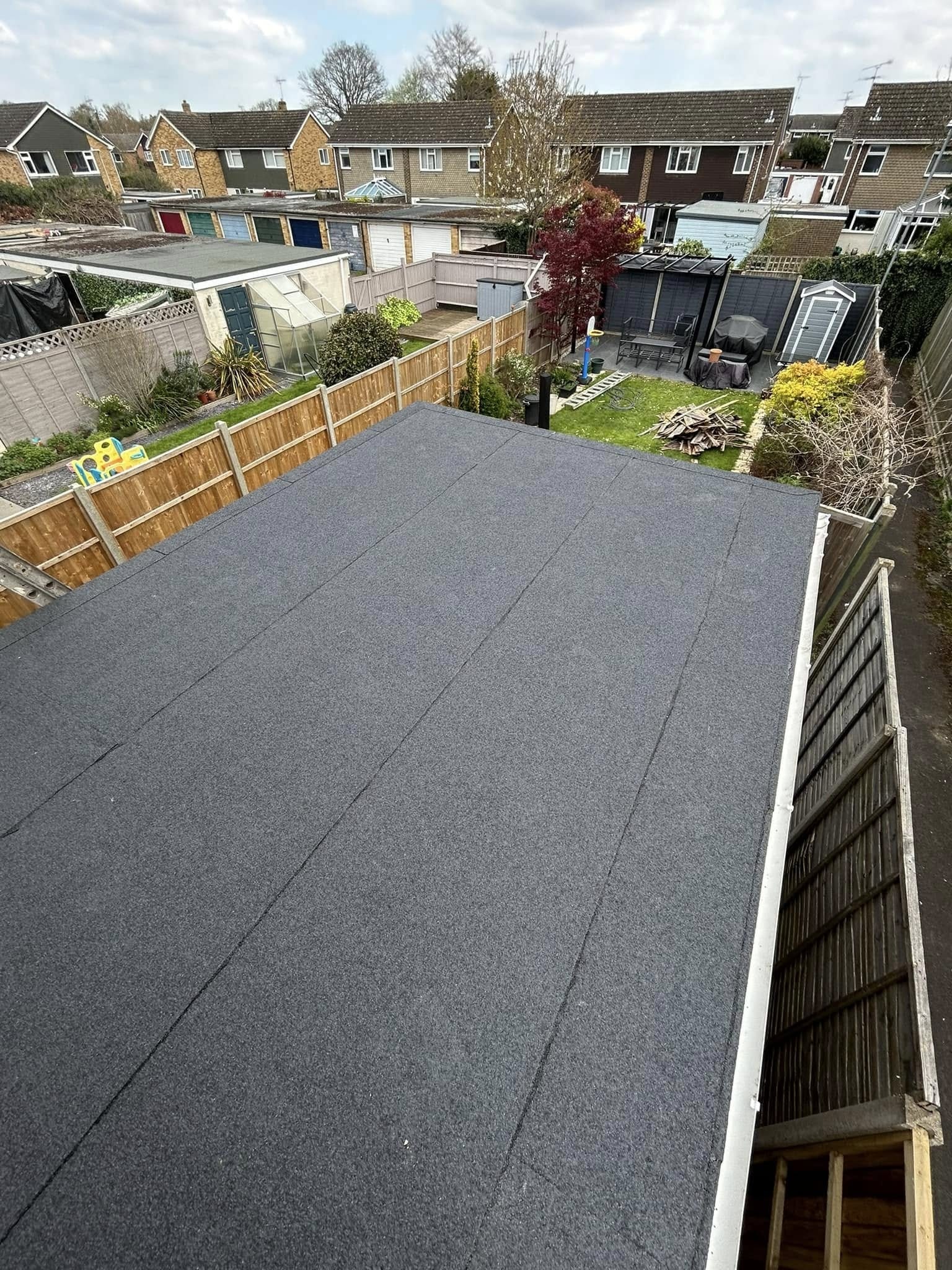Newly completed mineral felt flat roof on a Reading home extension